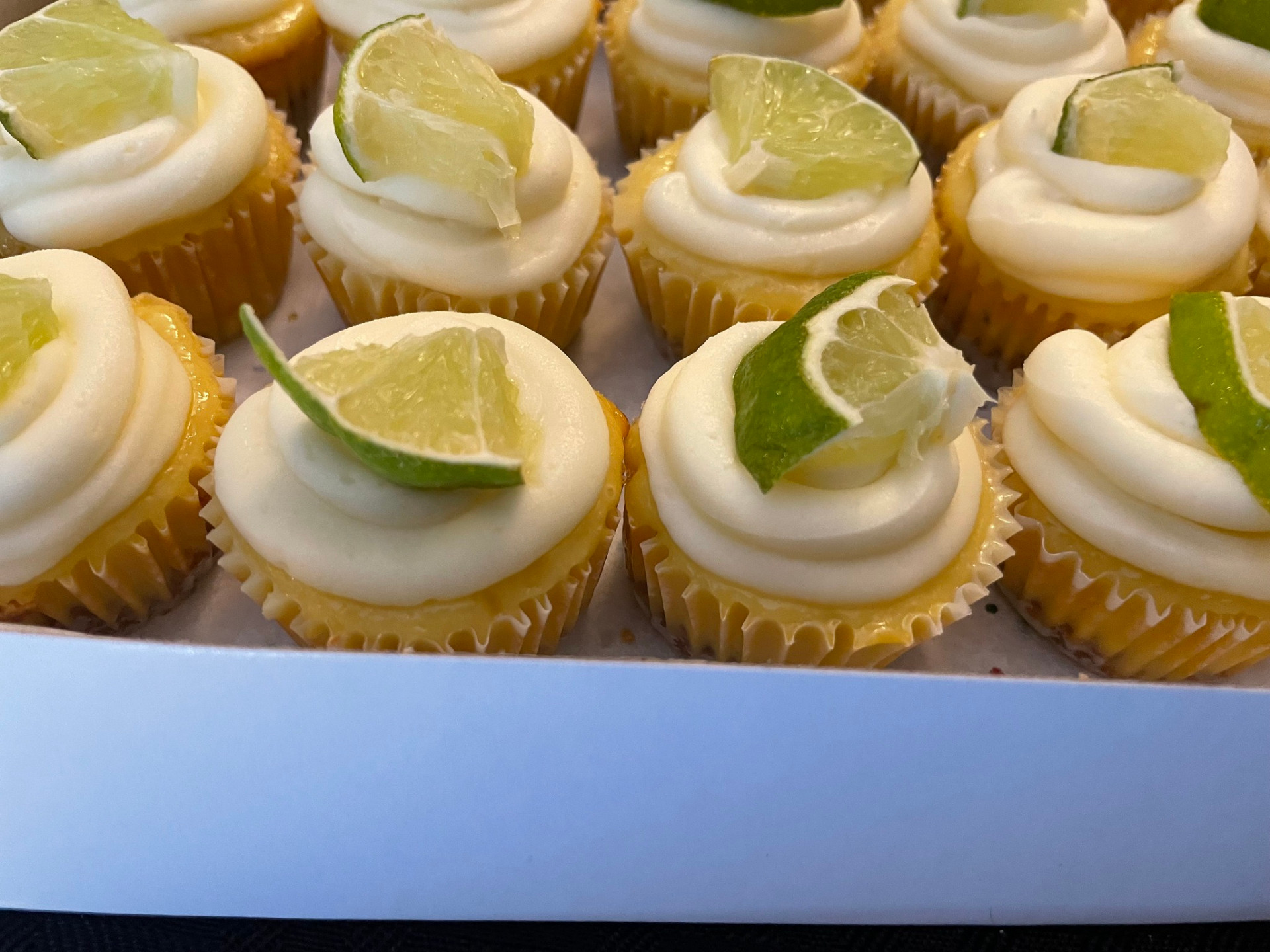 Key lime cupcakes with fresh lime garnish from Lupica's Sweet Treats
